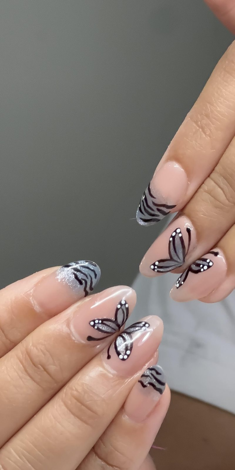 Butterfly nail art by Nails by Charan