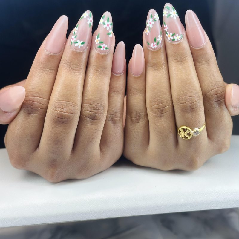 Floral almond nails by Nails by Charan
