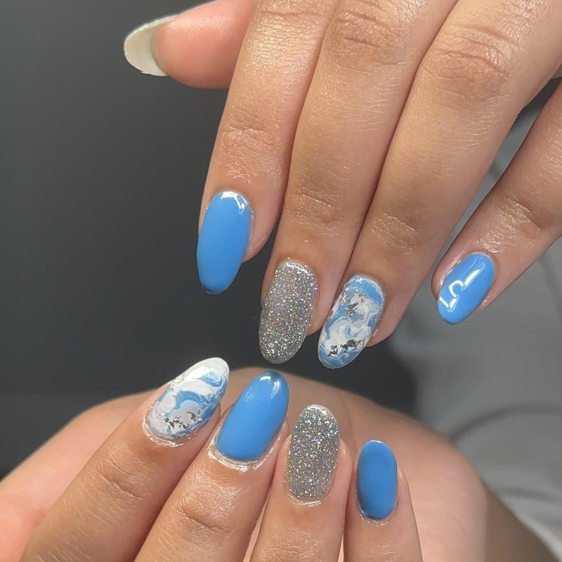 Blue and silver chrome nails by Nails by Charan